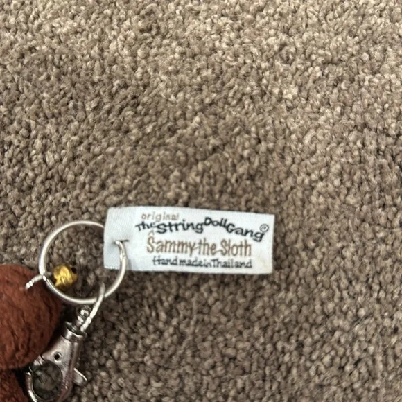 The string doll game Sammy the sloth keychain - Picture 3 of 3